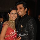 Ritesh Deshmukh &Genelia posing together at their wedding reception in Mumbai